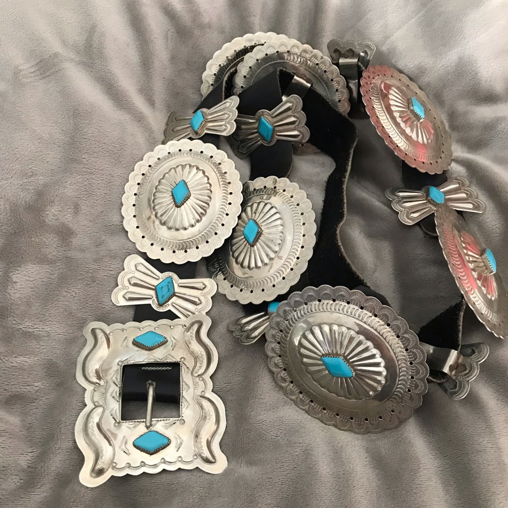 A nickel silver concho belt.